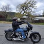 Picture of CoolBiz Web Design's Founder Riding a Harley Davidson in Redding, California