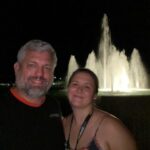 The Founder of CoolBiz Web Design and His Wife Standing in Front of the Fountain at the Civic Auditorium in Redding, California at Nigh