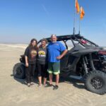 Picture of CoolBiz Web Design's Founder with some Friends Standing by Their Side-by-Sides in the High Mountain Desert of Christmas Valley Sand Dunes, Oregon