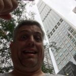 Picture of CoolBiz Web Design's Founder Standing Next to 432 Park Pencil Tower in New York City