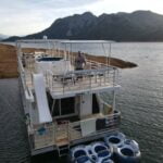 Picture of CoolBiz Web Design's Founder on the Upper Deck of a a Houseboat on Shasta Lake