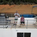 Picture of CoolBiz Web Design's Founder and His Wife on the Upper Deck of a a Houseboat on Shasta Lake